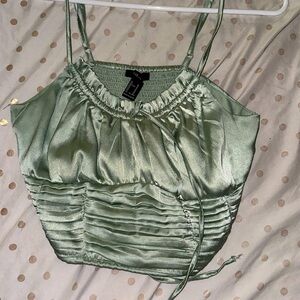 Satin course forever 21 tank top. Supper cute for the summer. Love the color